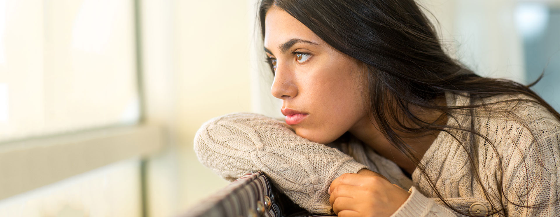 A woman thinking about abortion as an option