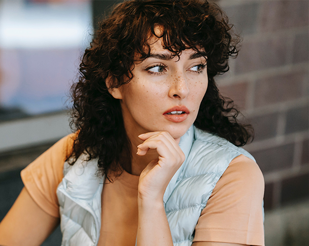 Someone thinking about pregnancy symptoms