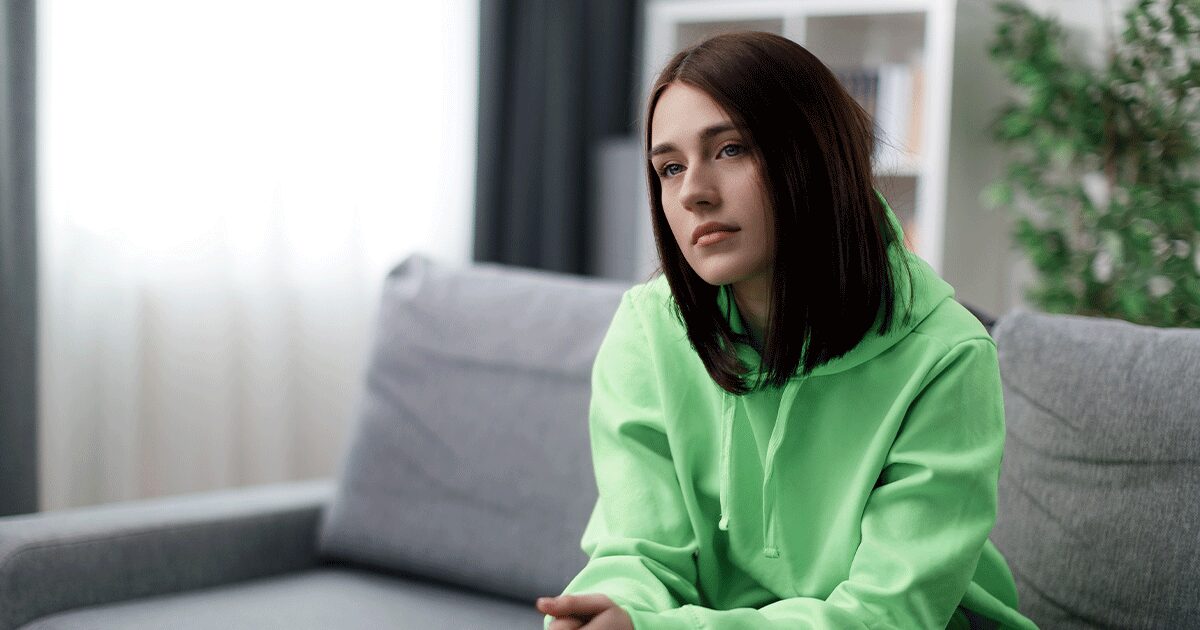 A woman thinking about her pregnancy ultrasound results